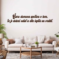 Drevený nápis na stenu - Čaro domova spočíva v tom,