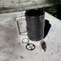 Hrnček pneumatiky v krabičke